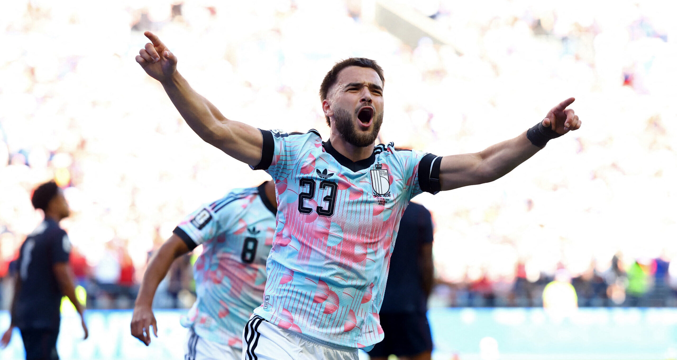 jogador da Bélgica comemorando em campo