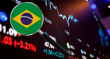 Montagem com um fundo de gráfico de ações e a bandeira do Brasil dentro de uma lupa